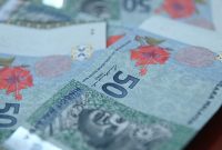 Foto : Mata Uang Ringgit Malaysia Pecahan 50 (Sumber : Freepik)