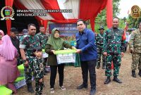 Foto : Ketua DPRD Hutri Randa kut memeriahkan penutupan TNI Manunggal Membangun Desa (TMMD) ke-126 Tahun 2025 (Dok DPRD)
